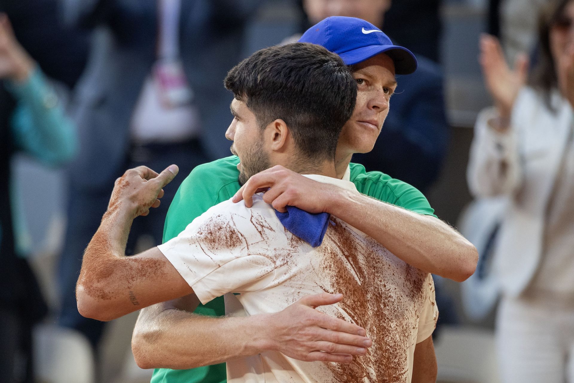 Jannik Sinner and Carlos Alcaraz hugging each other after the conclusion of the 2025 French Open men's singles final (Source: Getty)